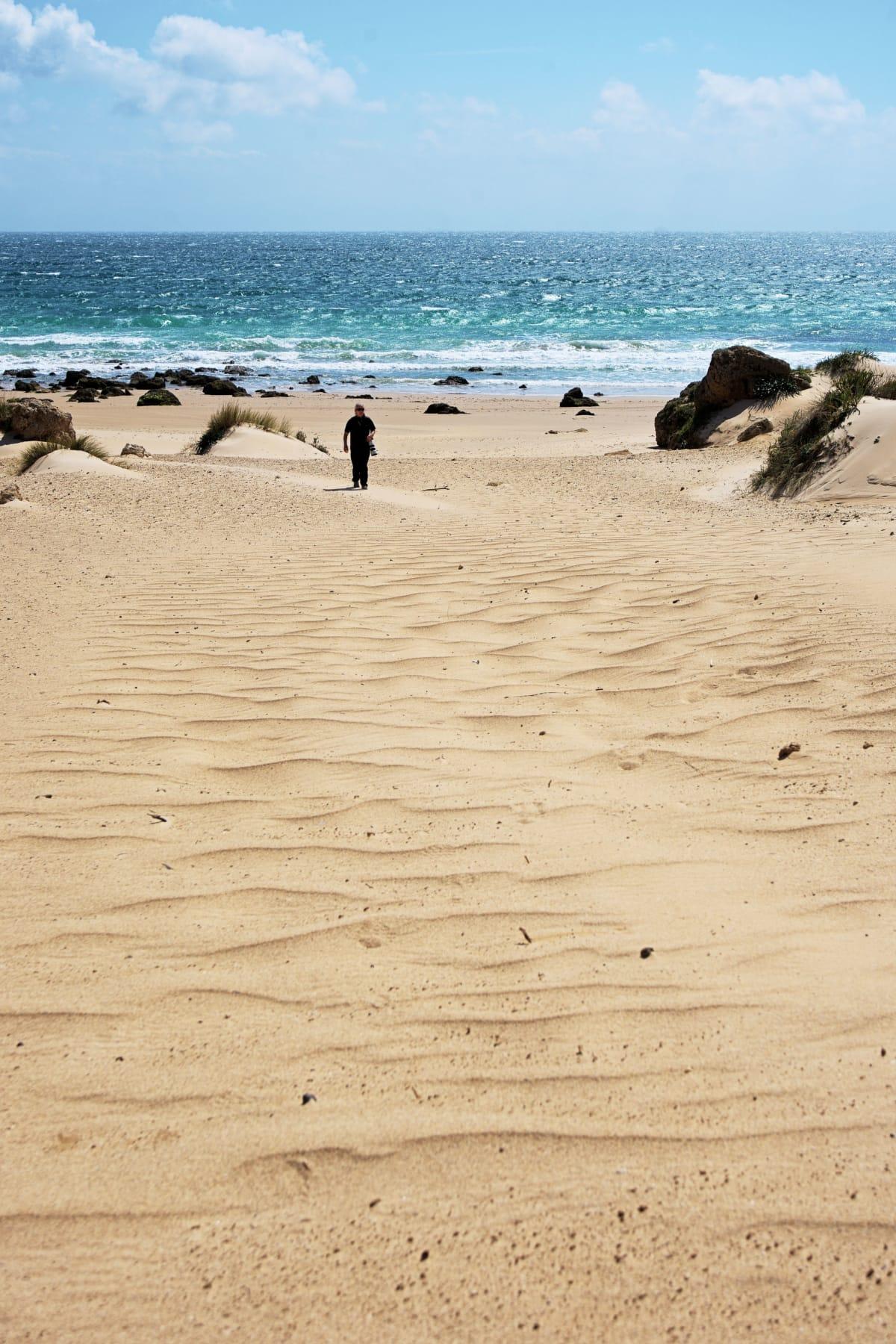 Ascending up the Duna de Bolonia from the sea