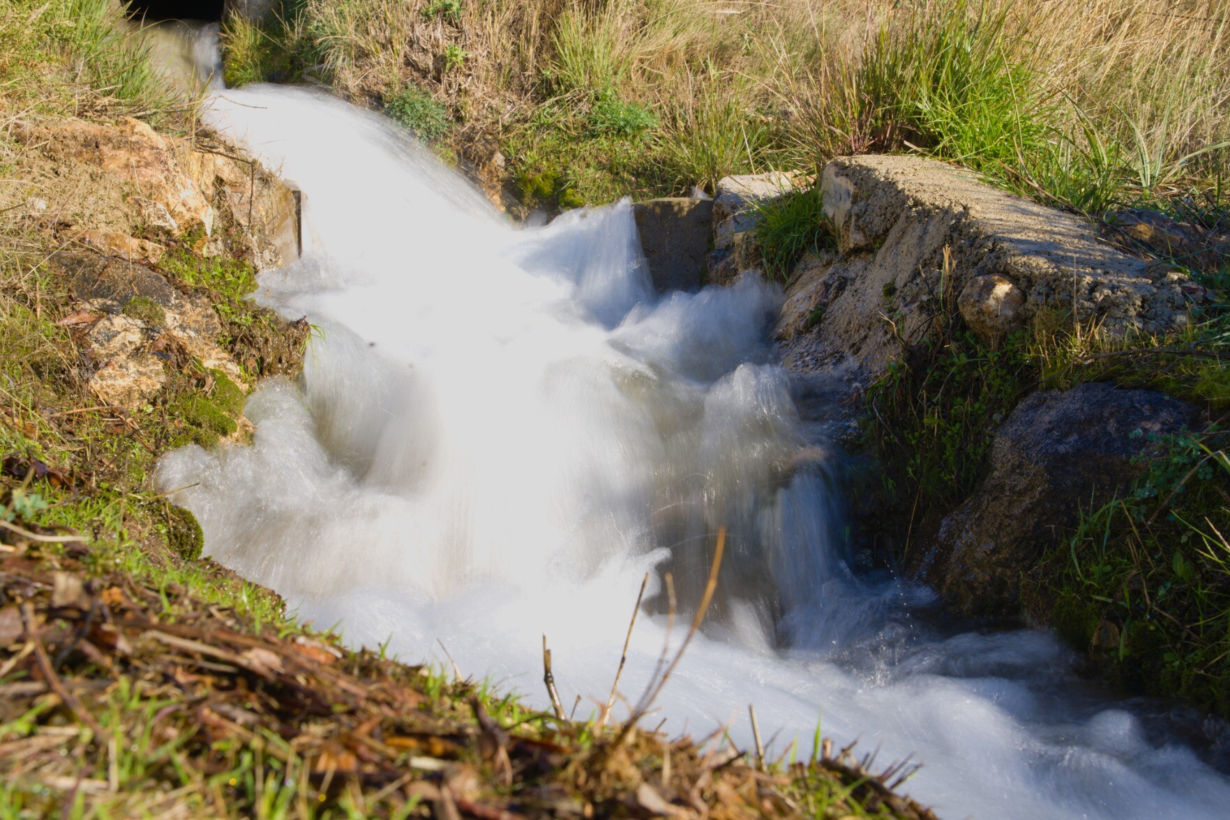 Slow down water in an irrigation channel in Andalucia