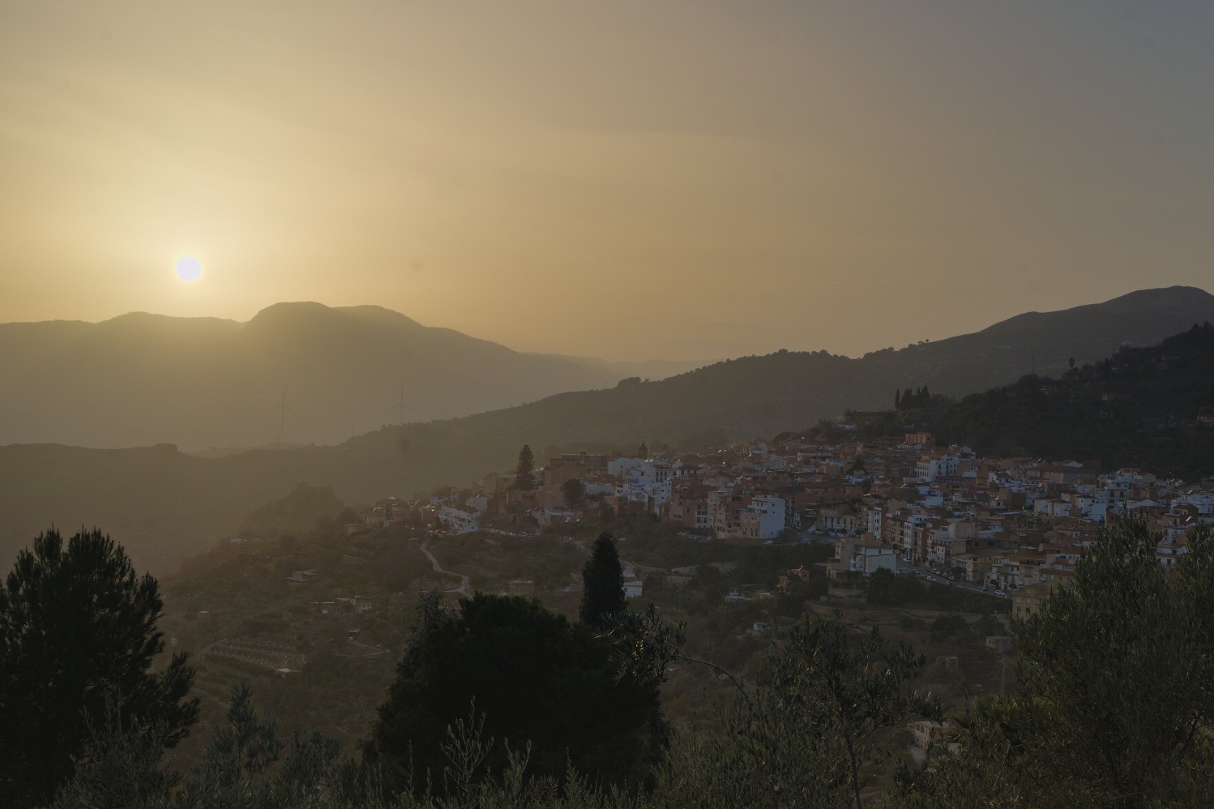 A sunset over Lanjaron town in southern Spain. The sunset affected by sahara dust in the air