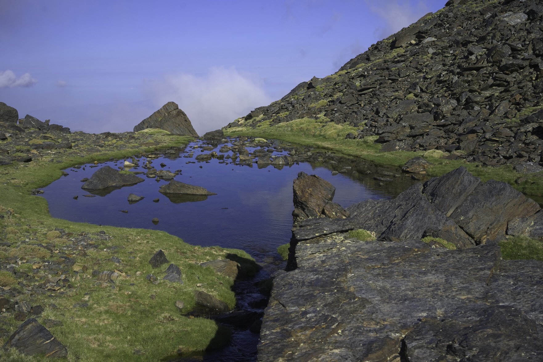 A beautiful bright blue mountain lake