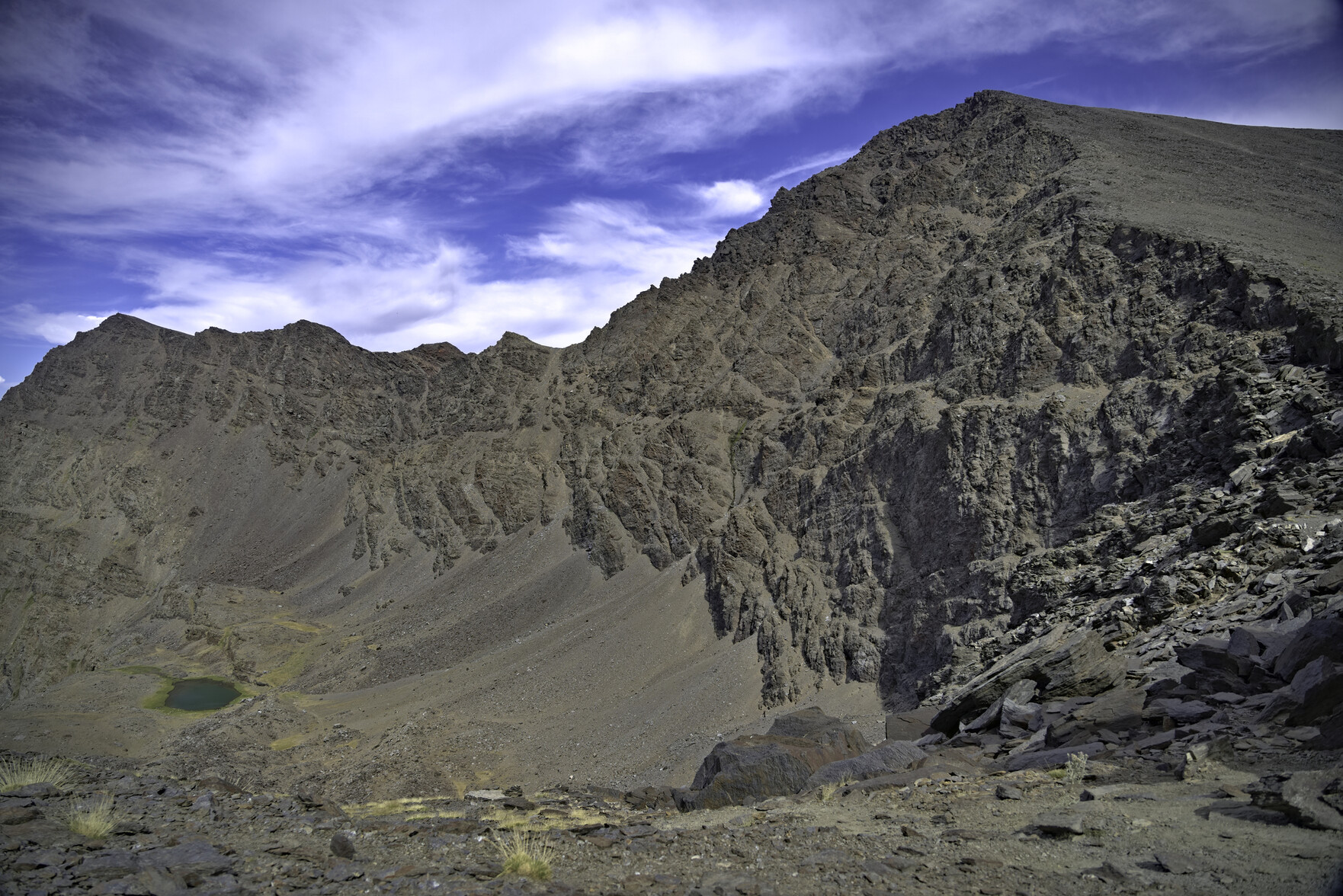 The north face of Mulhacen with the line of the hiking trail crossing at half height