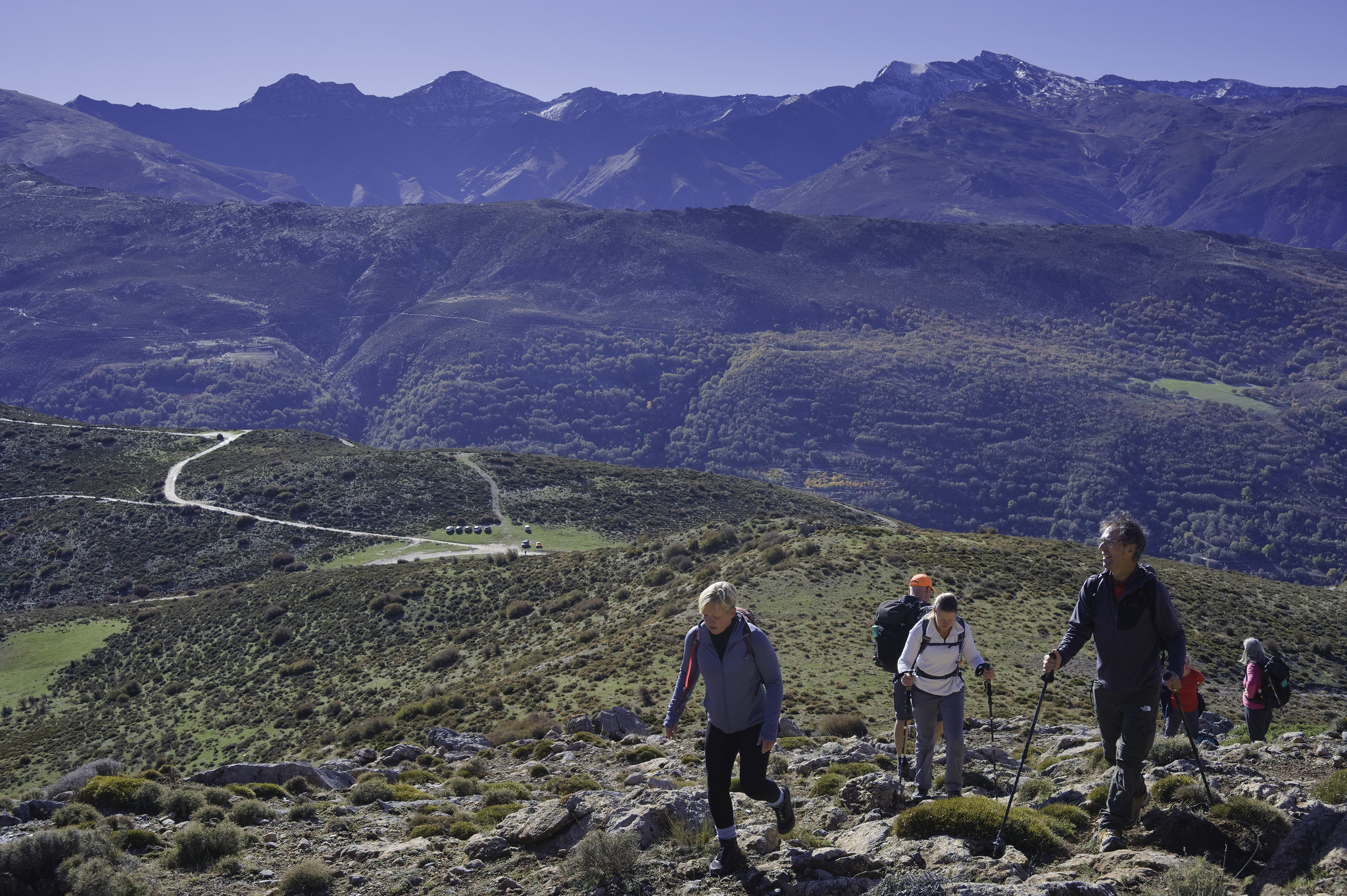 Ascending Alto de Miguelejos (2017m) from the car park at Collado de Alguacil. Behind rises the Sierra Nevada high peaks