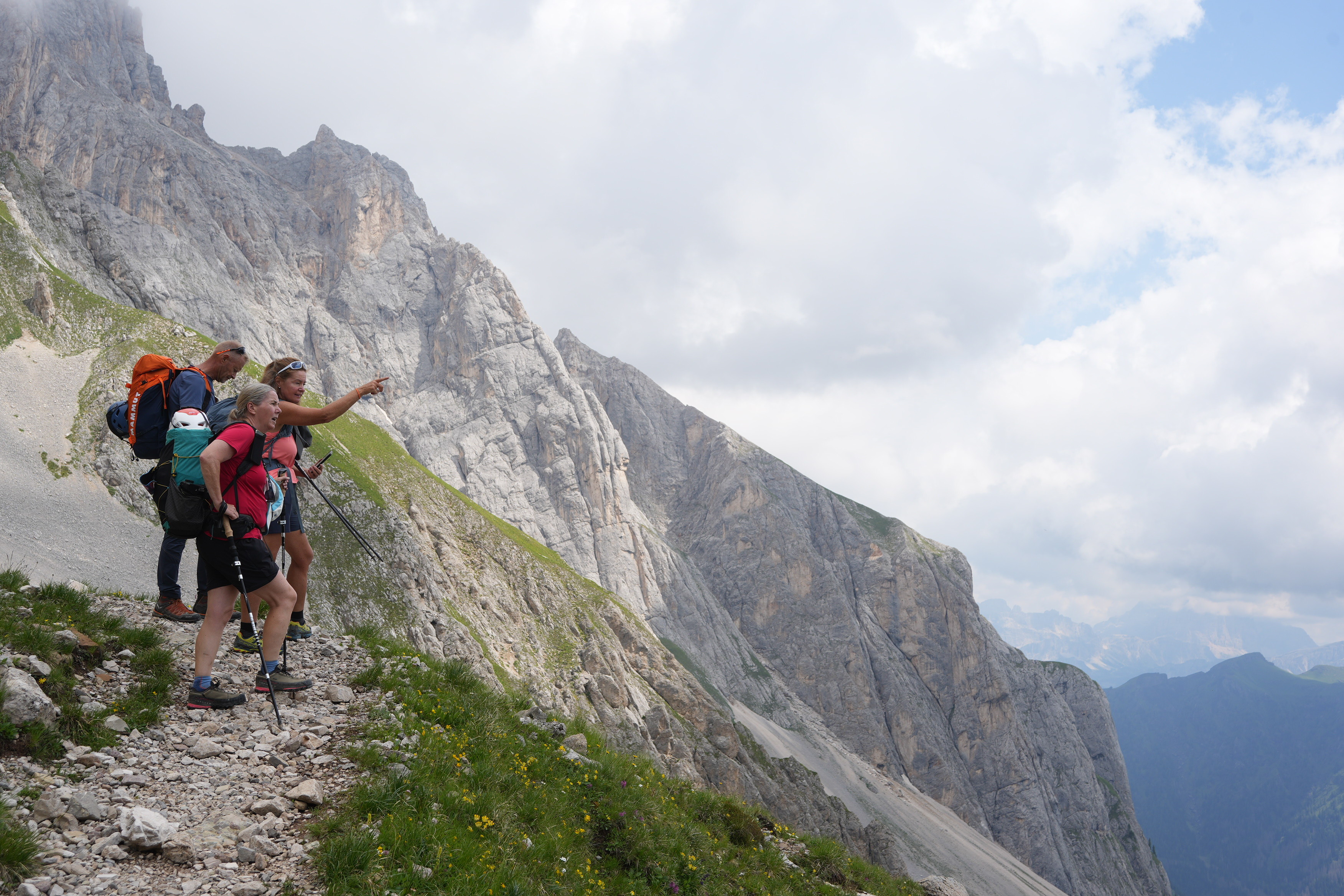 Looking at the stunning view. The south face of the Marmolada mountain behind