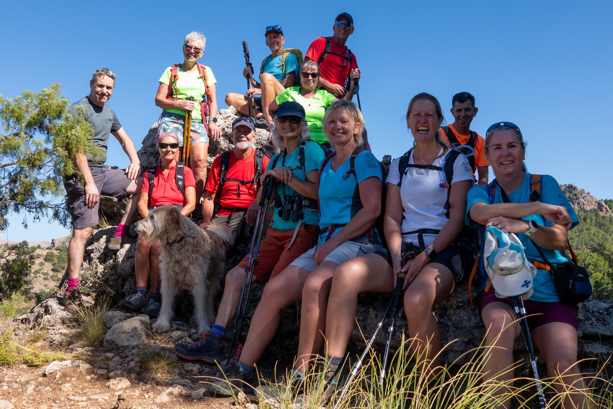 Lots of very happy and colorful hikers enjoying the great outdoors!