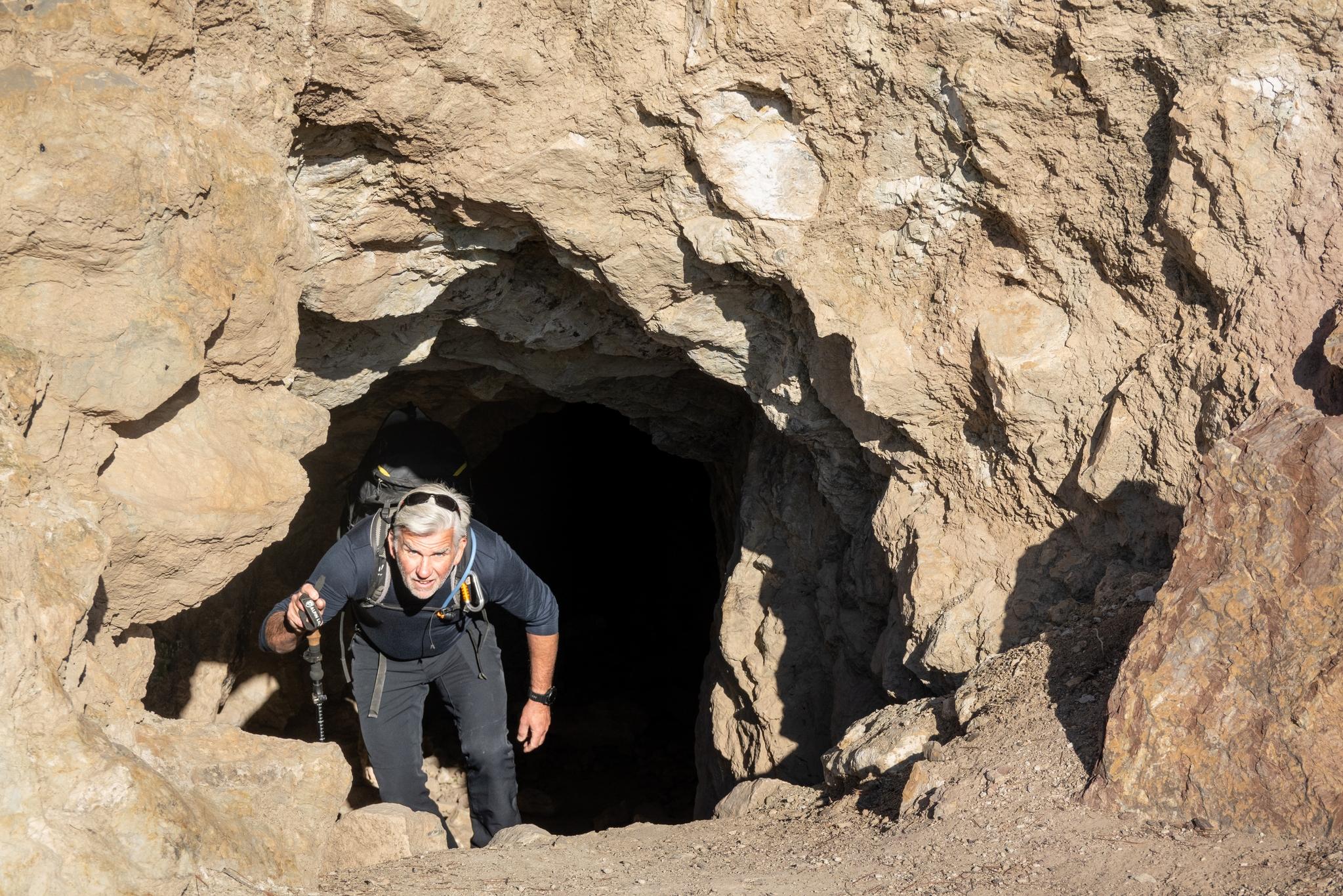 Appearing out of a deep cave near the start of the route