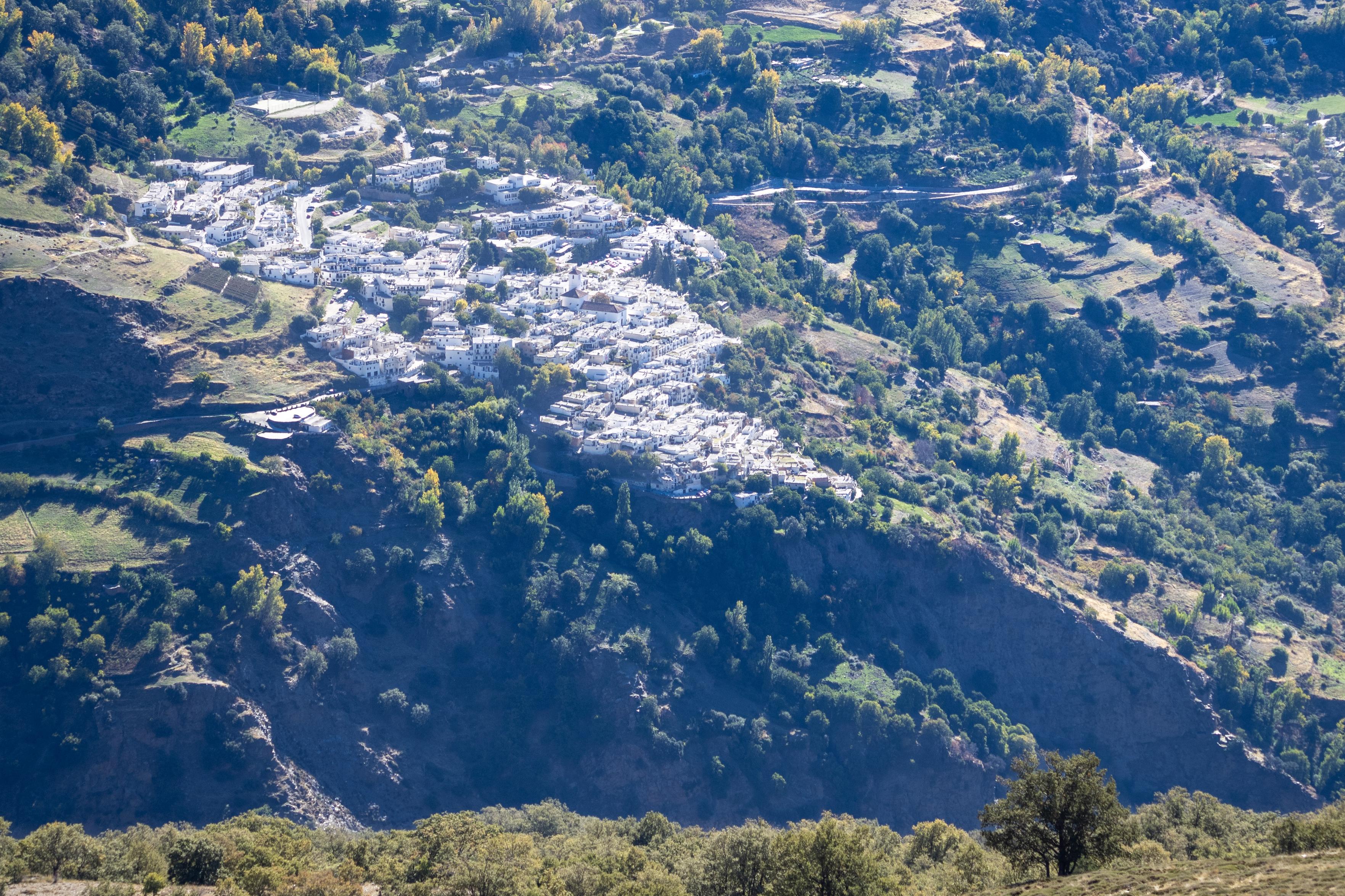 The morning sun has reached all parts of the village but the Barranco de Poqueira remains in shadow,