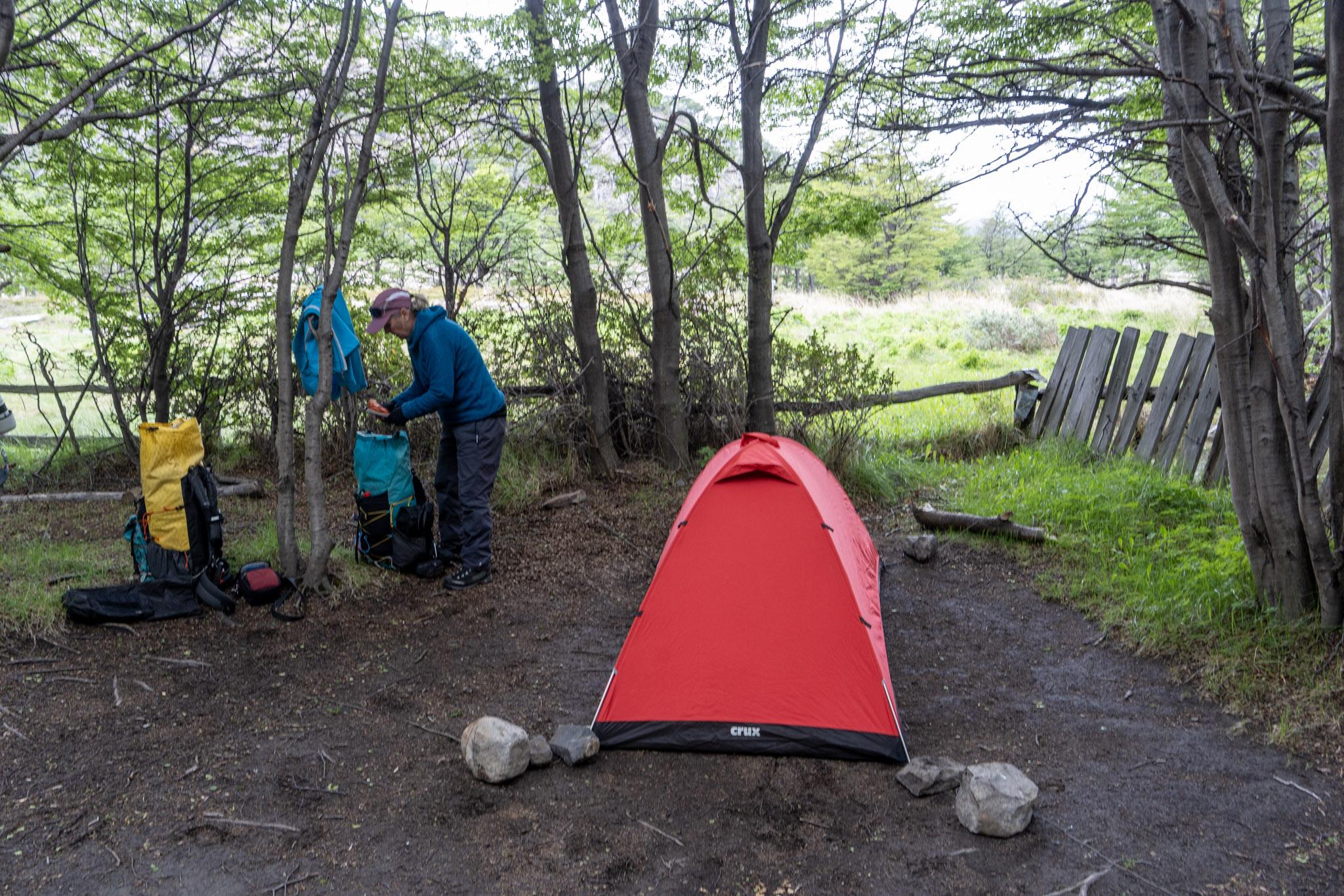 Our red tent is pitched just inside the refuge boundary, surrounded by trees and protection from the winds